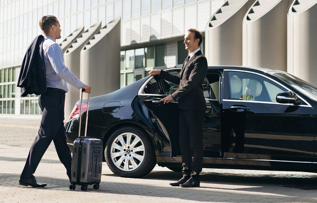 Black van airport transfer service